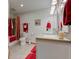 Bathroom with a shower-tub combo, tile flooring, and neutral-colored walls at 2274 W Huntsville Rd, Pendleton, IN 46064