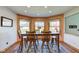 Bright dining room with a rustic table and chairs set, paired with a charming bay window at 2274 W Huntsville Rd, Pendleton, IN 46064