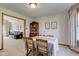 Inviting dining room adjacent to living area, featuring carpet and classic decor at 2274 W Huntsville Rd, Pendleton, IN 46064