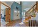 Elegant foyer with hardwood floors and a staircase with views into other rooms at 2274 W Huntsville Rd, Pendleton, IN 46064