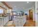 Spacious kitchen with an island, white cabinets, and stainless steel appliances at 2274 W Huntsville Rd, Pendleton, IN 46064