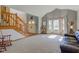 Inviting living room with a staircase, large windows, and comfortable seating at 2274 W Huntsville Rd, Pendleton, IN 46064