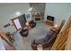 Spacious living room with a brick fireplace, comfortable seating, and ample natural light at 2274 W Huntsville Rd, Pendleton, IN 46064