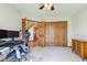 Well-lit home office with carpet floors, closet, and a wooden door at 2274 W Huntsville Rd, Pendleton, IN 46064