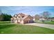 Spacious backyard featuring a pool, basketball court, and a well-maintained lawn at 2274 W Huntsville Rd, Pendleton, IN 46064