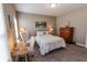 Bright bedroom with a comfortable bed and desk, perfect for relaxing or working at 2326 Saddle Dr, Shelbyville, IN 46176