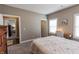 A peaceful bedroom showcasing a plush bed and soft, neutral tones at 2326 Saddle Dr, Shelbyville, IN 46176