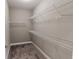 A walk-in closet, featuring carpet, offers ample storage with wire shelving at 2326 Saddle Dr, Shelbyville, IN 46176
