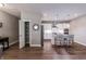 Bright, open kitchen featuring stainless steel appliances, a center island with seating, and a convenient pantry at 2326 Saddle Dr, Shelbyville, IN 46176
