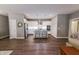 Bright, open-concept kitchen with stainless steel appliances, a center island, and hardwood floors throughout at 2326 Saddle Dr, Shelbyville, IN 46176