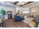 Bright living room showcasing an open floor plan that connects to the kitchen at 2326 Saddle Dr, Shelbyville, IN 46176
