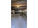 Unfinished basement space with exposed beams and concrete flooring at 2882 Simsbury Ln, Brownsburg, IN 46112