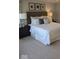 Bedroom featuring a comfortable bed with decorative pillows and matching dark wood nightstands at 2882 Simsbury Ln, Brownsburg, IN 46112