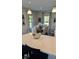 Bright dining area with table, chairs, and natural light coming in from windows and a sliding glass door at 2882 Simsbury Ln, Brownsburg, IN 46112