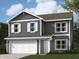 Charming two-story home showcases a well-maintained lawn, two-car garage, and a welcoming front porch at 3271 W Keepsake Ln, Monrovia, IN 46157