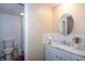 Bathroom featuring a toilet, sink, mirror and modern design at 3335 Woodcrest Ct, Columbus, IN 47203