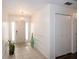 Bright foyer with ceramic tile flooring, complemented by decorative accents and fresh white walls at 3335 Woodcrest Ct, Columbus, IN 47203