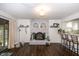 Comfortable living room with a brick fireplace, bar seating, and seamless flow into the kitchen at 3335 Woodcrest Ct, Columbus, IN 47203