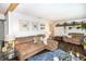 Spacious living room with a cozy sectional, modern decor, and an open layout for entertaining at 3335 Woodcrest Ct, Columbus, IN 47203