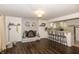Inviting living room with a brick fireplace, breakfast bar, and convenient access to the kitchen at 3335 Woodcrest Ct, Columbus, IN 47203