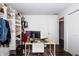 This home office features open closet space and a desk, providing an organized and efficient workspace at 3335 Woodcrest Ct, Columbus, IN 47203
