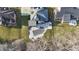 Aerial view of a home with a covered pool and spacious backyard, perfect for outdoor entertaining at 4140 Sagewood Ct, Greenwood, IN 46143