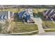 A beautiful home, with pristine landscaping, a backyard basketball court, and an inviting outdoor patio at 4140 Sagewood Ct, Greenwood, IN 46143