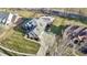Large brick home with ample yard space, a basketball court, and a pool at 4140 Sagewood Ct, Greenwood, IN 46143