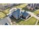 Expansive backyard with patio, pool, and basketball court in a private setting at 4140 Sagewood Ct, Greenwood, IN 46143