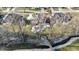 Aerial view of a home with beautiful landscaping, a creek, and a small bridge at 4140 Sagewood Ct, Greenwood, IN 46143
