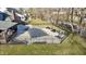 An aerial view of the backyard featuring a covered pool and a luxurious lounge area, ideal for entertaining at 4140 Sagewood Ct, Greenwood, IN 46143