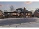 Beautiful backyard featuring a covered deck, inground pool, and a brick house at 4140 Sagewood Ct, Greenwood, IN 46143