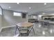 Finished basement with octagonal card table, ping pong, and movie area, offering diverse entertainment at 4140 Sagewood Ct, Greenwood, IN 46143