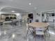 Finished basement with projector, ping pong table, card table, television, exercise room at 4140 Sagewood Ct, Greenwood, IN 46143