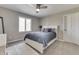 Bedroom with ceiling fan, white trim, and natural light at 4140 Sagewood Ct, Greenwood, IN 46143