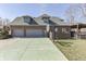 Spacious three-car garage with a basketball court, providing ample parking and recreational space at 4140 Sagewood Ct, Greenwood, IN 46143