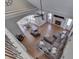 Open-concept living room boasts hardwood floors, fireplace, and vaulted ceilings for a spacious feel at 4140 Sagewood Ct, Greenwood, IN 46143