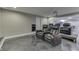 View of the luxurious home theater room with seating and modern entertainment system at 4140 Sagewood Ct, Greenwood, IN 46143