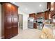 Spacious kitchen with stainless steel appliances, a breakfast bar, and plenty of cabinet storage at 4347 Westminster Pl, Columbus, IN 47201