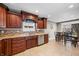 Beautiful kitchen with granite counters, tile backsplash, and stainless steel appliances; ready for cooking at 4347 Westminster Pl, Columbus, IN 47201