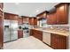 Well-equipped kitchen featuring stainless steel appliances, granite countertops, and ample cabinet space at 4347 Westminster Pl, Columbus, IN 47201