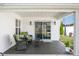 Covered patio with outdoor furniture and view of backyard at 4347 Westminster Pl, Columbus, IN 47201