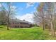 Spacious backyard with a large brick house and ample green space at 4491 N 75 W, Franklin, IN 46184