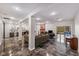 Expansive basement living area with wet bar, fireplace, and sliding glass doors to the exterior at 4491 N 75 W, Franklin, IN 46184