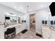 Well-lit bathroom with and vanities, stylish fixtures, and a separate shower room at 4491 N 75 W, Franklin, IN 46184