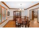 Elegant dining room with wood table, china cabinet and beautiful chandelier at 4491 N 75 W, Franklin, IN 46184