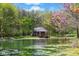 Charming home nestled by a serene pond and blooming trees, offering a peaceful retreat at 4491 N 75 W, Franklin, IN 46184