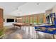 Entertaining game room features a pool table, pinball machines, and access to the backyard at 4491 N 75 W, Franklin, IN 46184