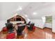 Home theater with tiered seating, large screen, and built-in shelving for entertainment at 4491 N 75 W, Franklin, IN 46184