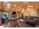Cozy living room with wood paneling, fireplace, and comfortable seating at 4491 N 75 W, Franklin, IN 46184